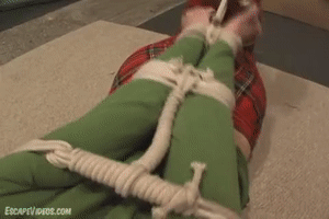 www.escapevideos.com - Alexis Xmas Ball Gagged thumbnail